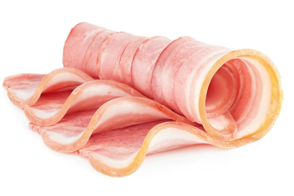 9699733 - tasty sliced pork bacon isolated on white background